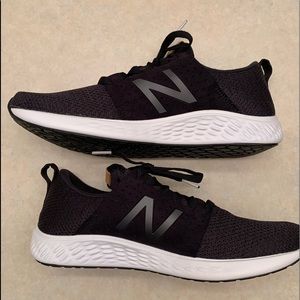 Black New Balance tennis shoes, size 11